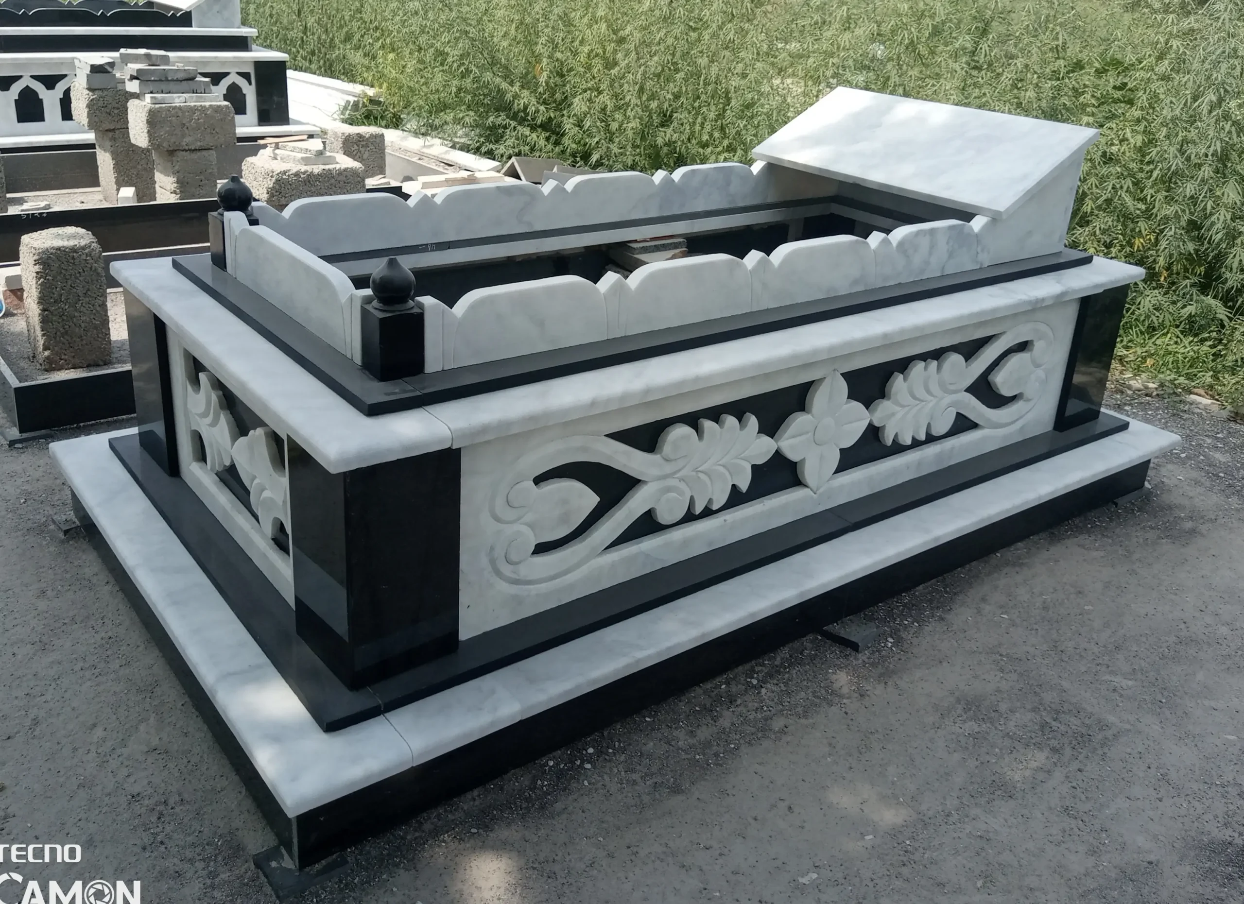 contrast grave of rehman white and black granite