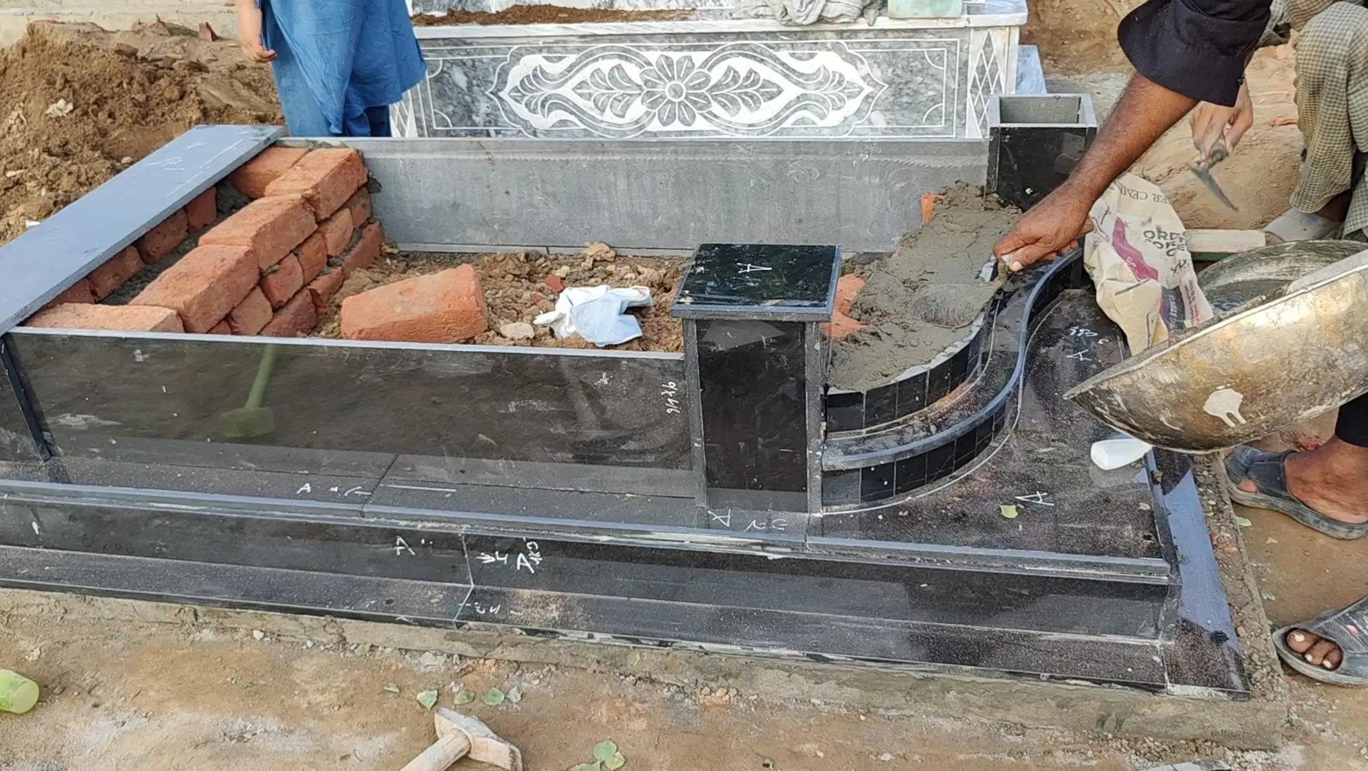 skilled labour for grave fitting